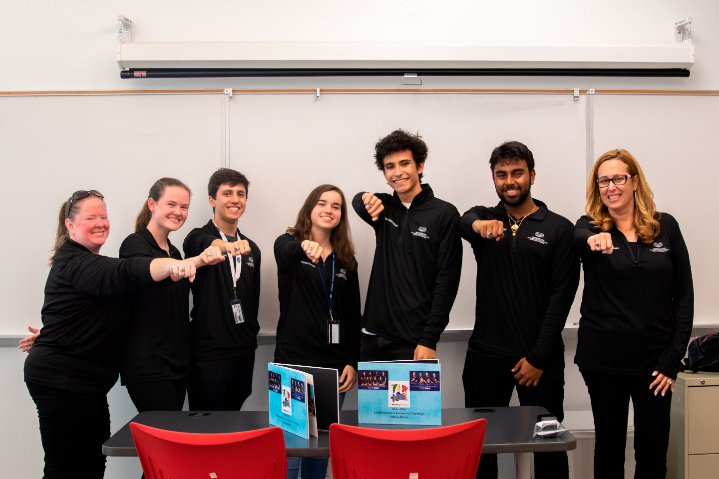 Sherry Bees, principal/director of A.D. Henderson and FAU High School, presented the team with state championship rings.