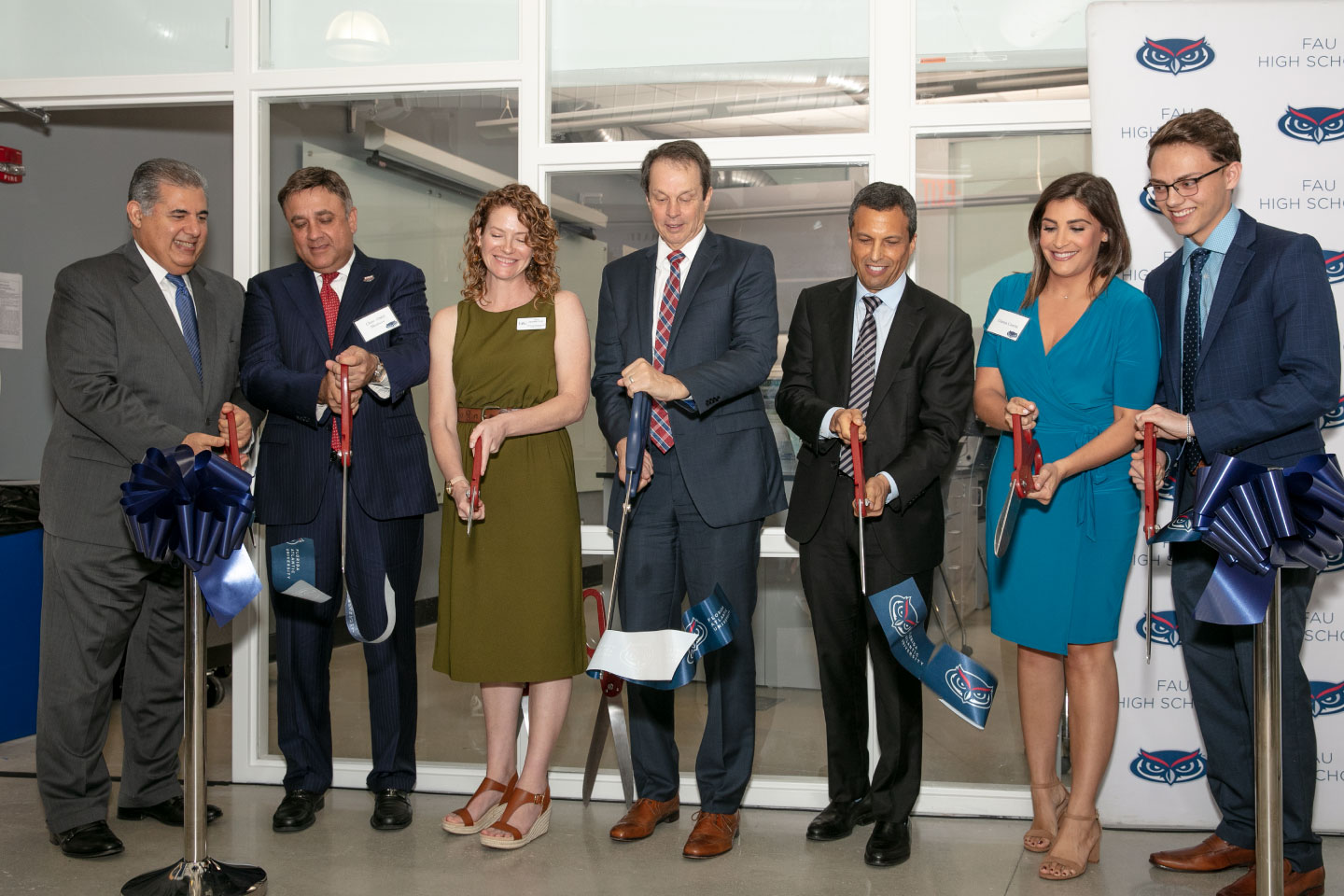 From left to right, Anthony Barbar, FAU Board of Trustees chair emeriti; FAU Board of Trustees Chair Abdol Moabery; Tricia Meredith, Ph.D.; FAU President John Kelly; Joel Herbst, Ed.D.; Gianna Caserta; Nick Pizzo. (Photo by Alex Dolce)